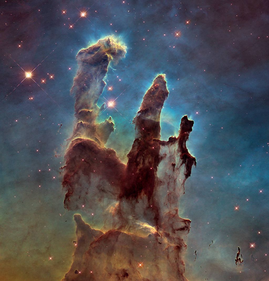 Hubble Space Telescope view of the &quot;Pillars of Creation,&quot; towering formations of cosmic gas and dust that lie in the center of the Eagle Nebula.