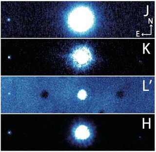 The planetary system around the star HAT-P-7 includes a companion star and two planets. These photos of the system were taken by the Subaru Telescope.