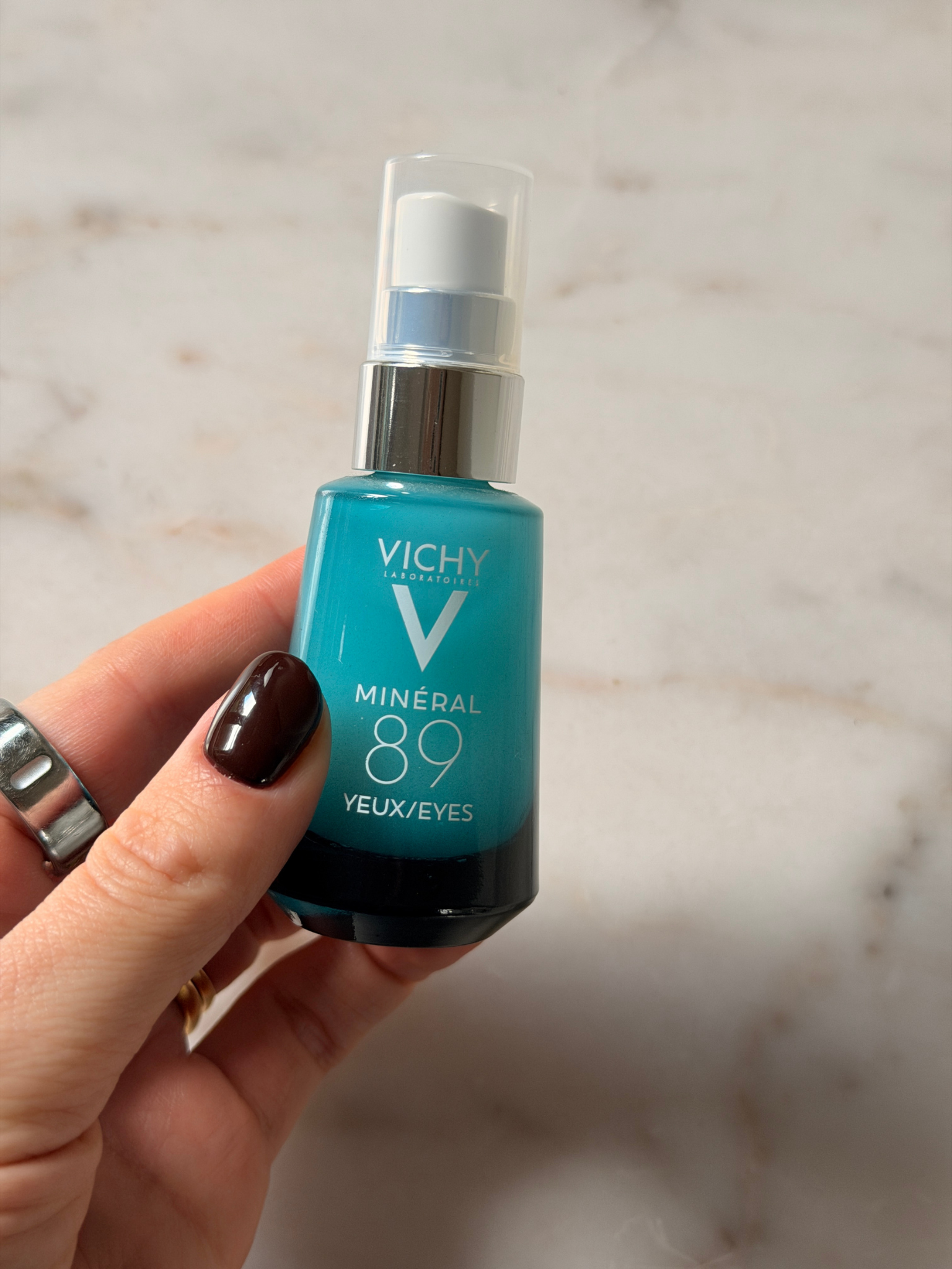 Freelance beauty editor Grace Day holding the Vichy eye cream