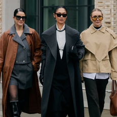 Photo of three women wearing Scandi winter outfit and street style looks during Copenhagen Fashion Week Fall-Winter 2025.