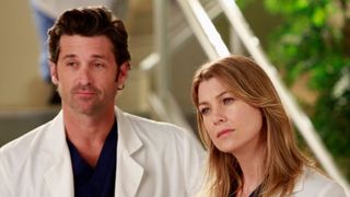 Patrick Dempsey and Ellen Pompeo as Derek and Meredith standing side by side in Grey's Anatomy