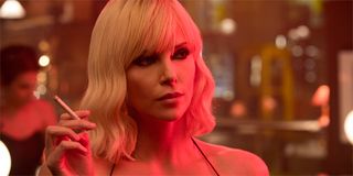 Charize Theron in Atomic Blonde smoking a cigarette