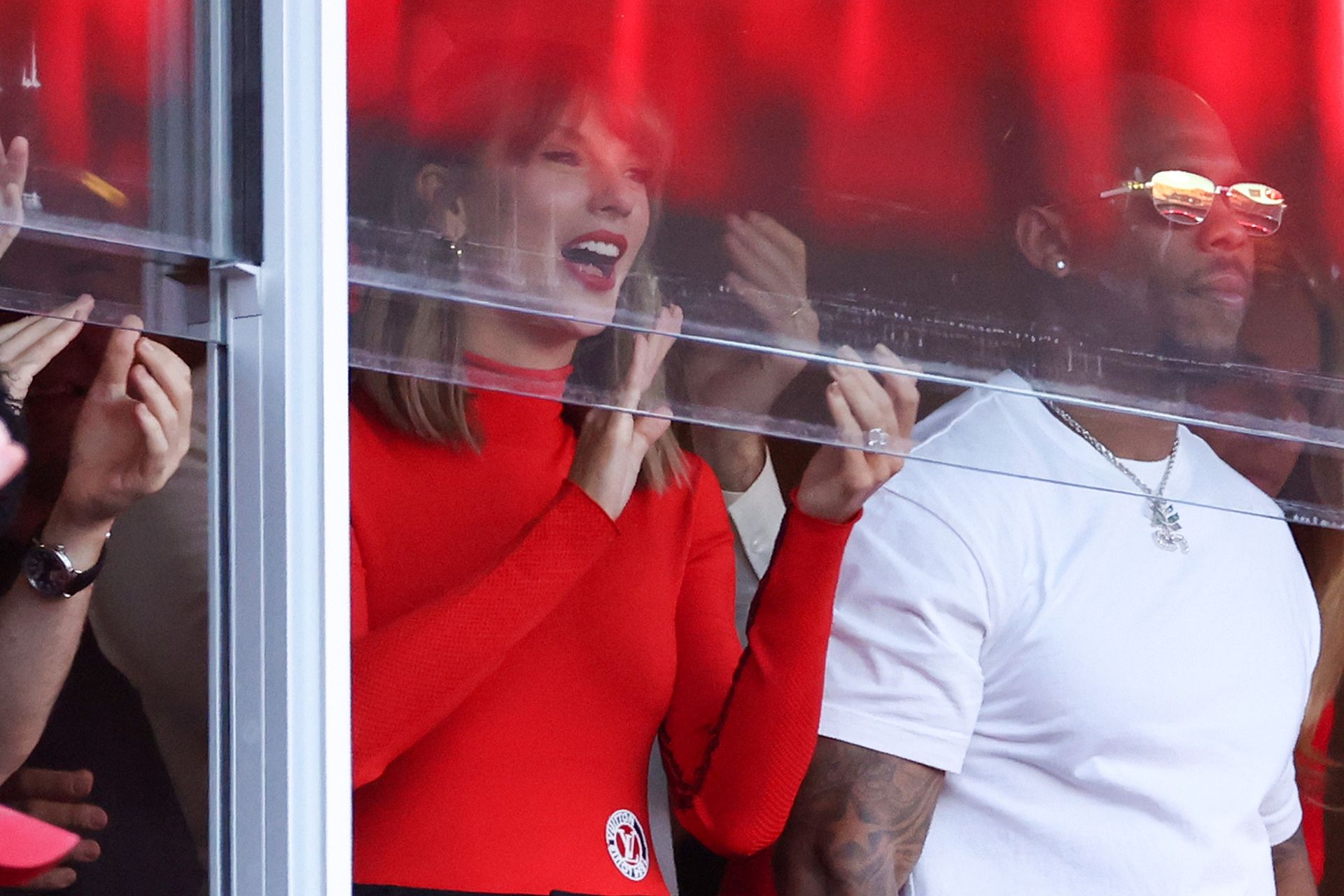 Taylor Swift's turtleneck at the Kansas City Chiefs game is perfect for Fall 2026's red color trend