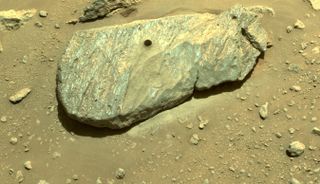The Martian boulder "Rochette" now has a perfect drill-hole imprinted in its ancient side.