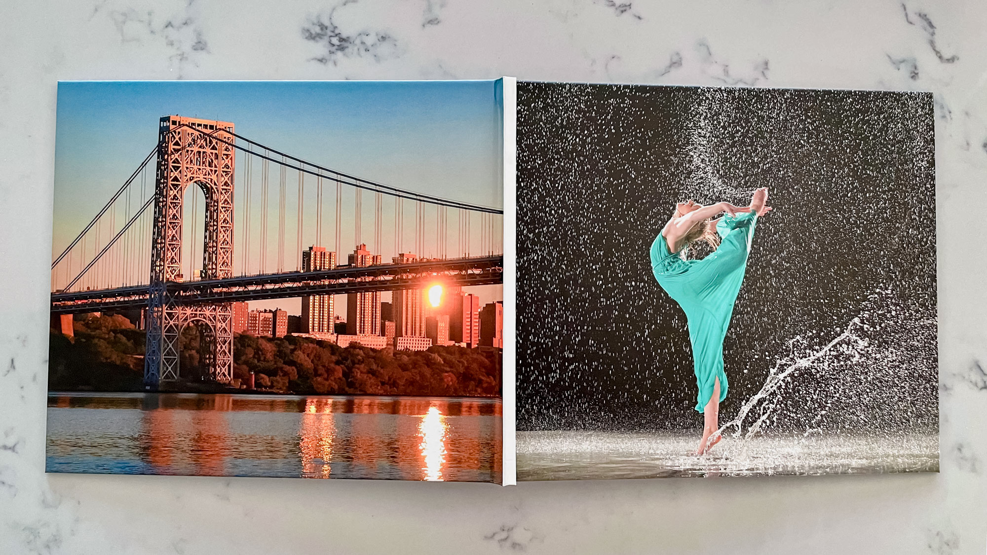 The front and back cover of a Blurb photo book on a countertop surface