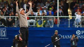 Bernhard Langer celebrates his winning putt during the PNC Championship