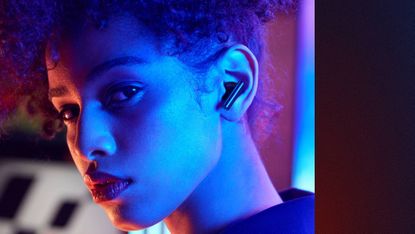 Realme Buds Air 3 review: woman wearing earbuds