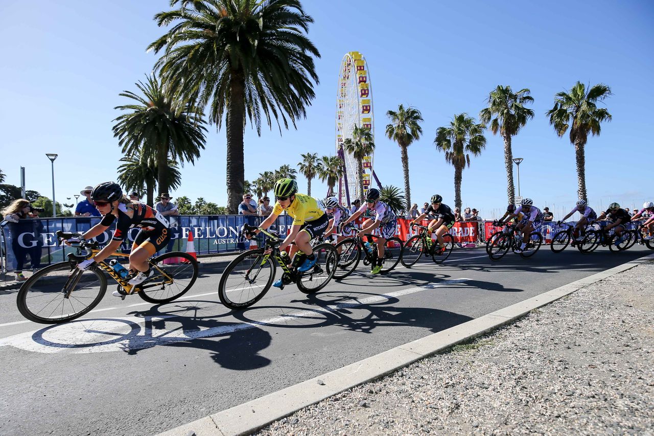 Amanda Spratt races in yellow after winning on day one