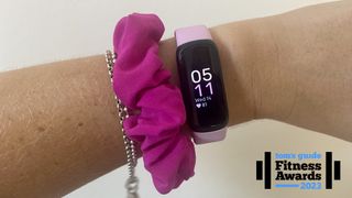 Fitbit Inspire 3 on a woman's wrist