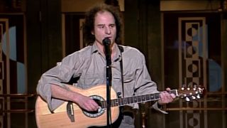 Steven Wright playing guitar on Saturday Night Live