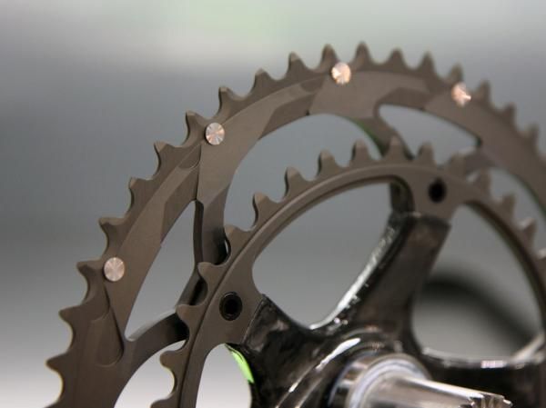Revised chainring shift ramps are said to deliver faster shifting than older Campagnolo 11-speed drivetrains.