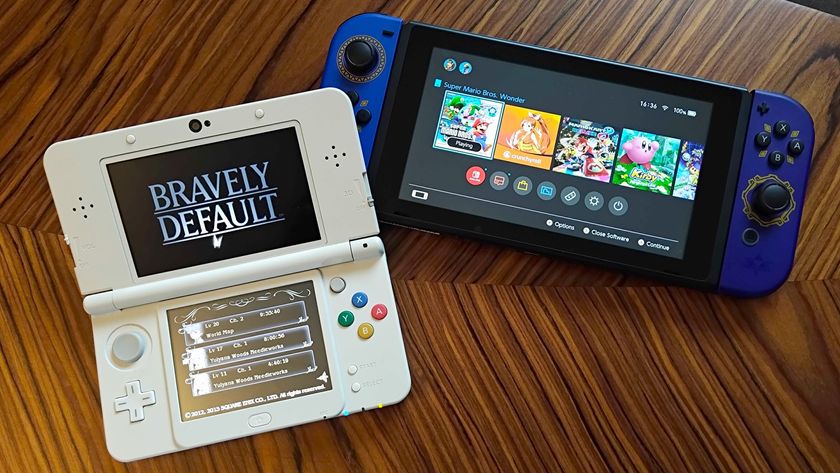 Nintendo Switch next to 3DS with Bravely default title screen displayed on woodgrain table