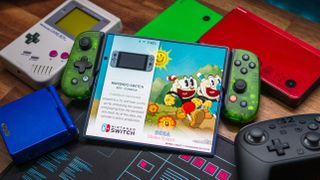 Samsung Galaxy Z Fold 7 with Backbone One Xbox Edition surrounded by Nintendo handhelds