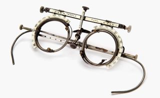 Metal and ivory phoropter test glasses