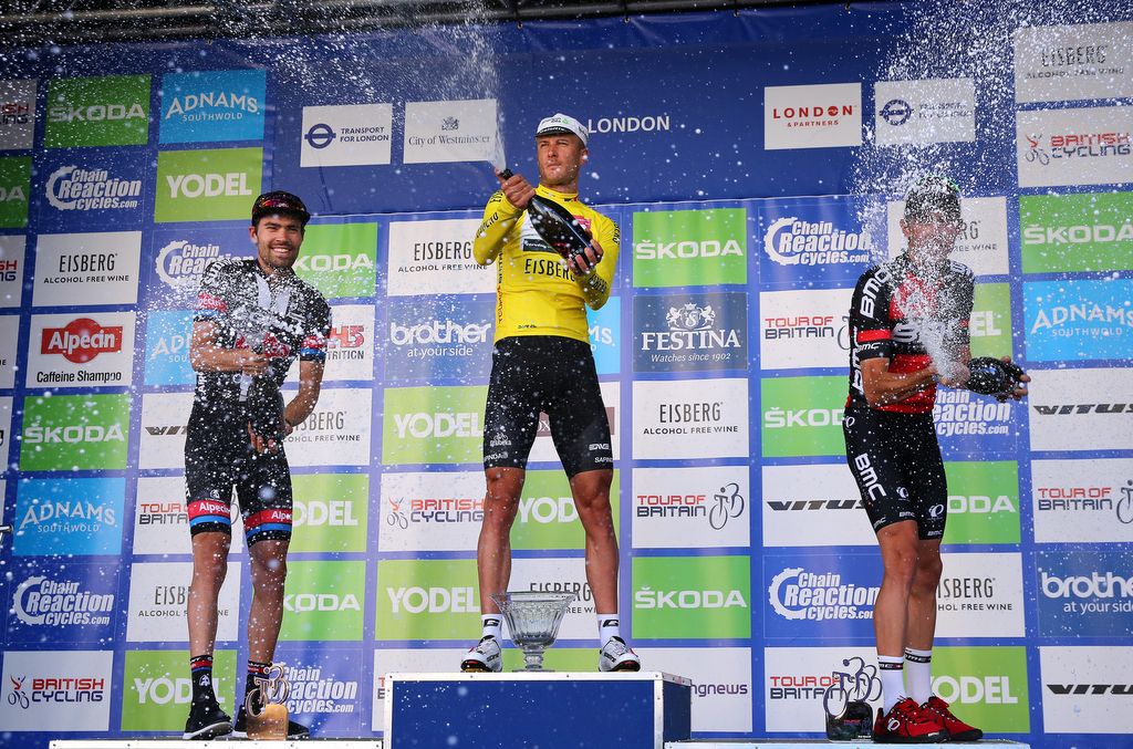 Tom Dumoulin (Giant-Alpecin), Steve Cummings (Dimension Data) and Rohan Dennis (BMC) spray the champagne