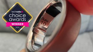 Oura Ring 4 showing its brand name and size on the ring's inside, with a logo superimposed that says TechRadar Choice Awards Winner 2025