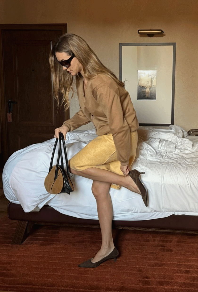 @annelauremais wearing a knee-length skirt.