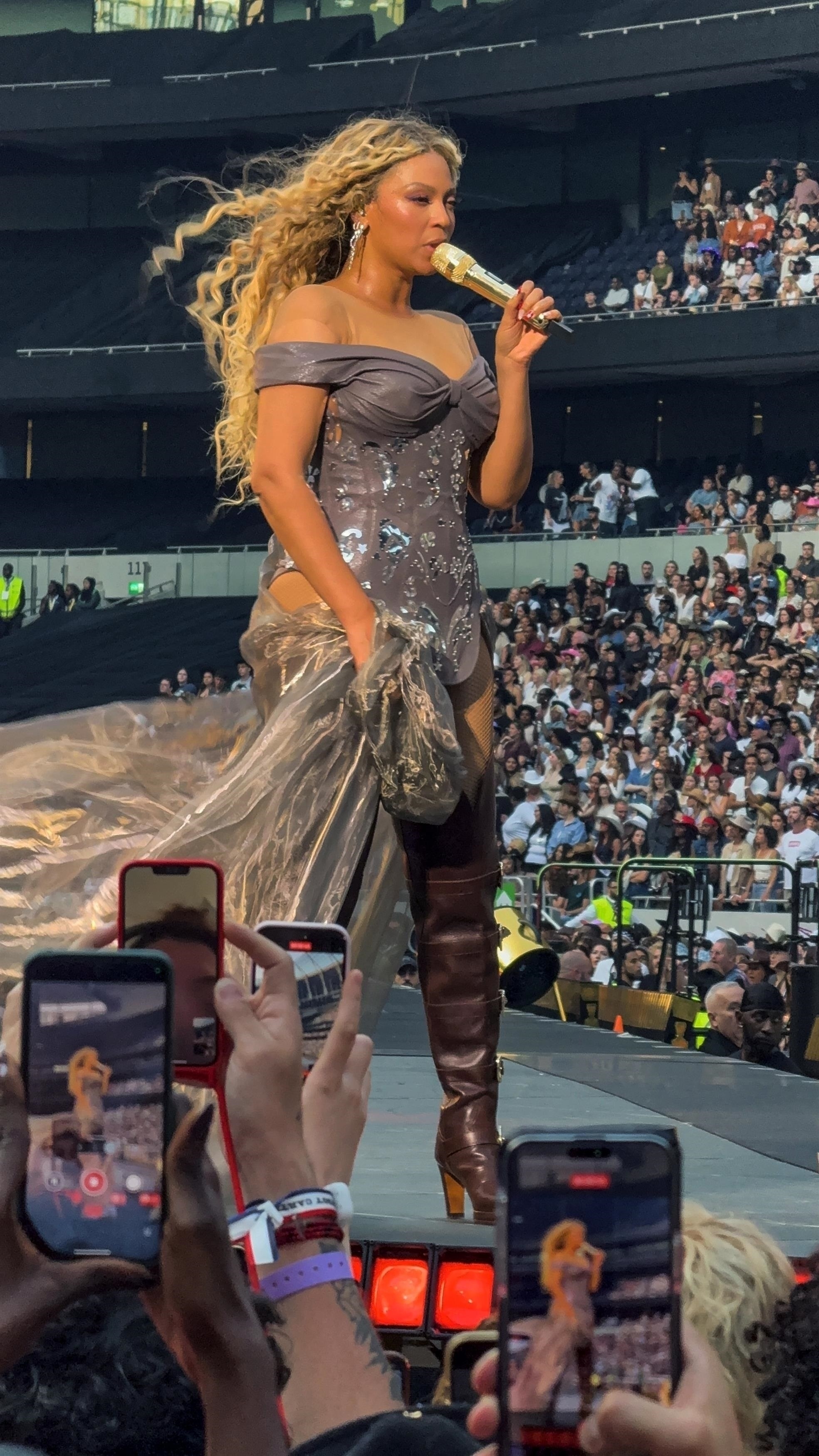 Beyoncé sports thigh-high cowboy boots from Partlow on the 'Cowboy Carter' tour.