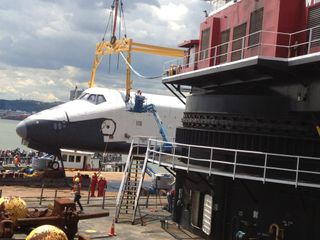 Enterprise Lifted by Crane onto Intrepid Museum