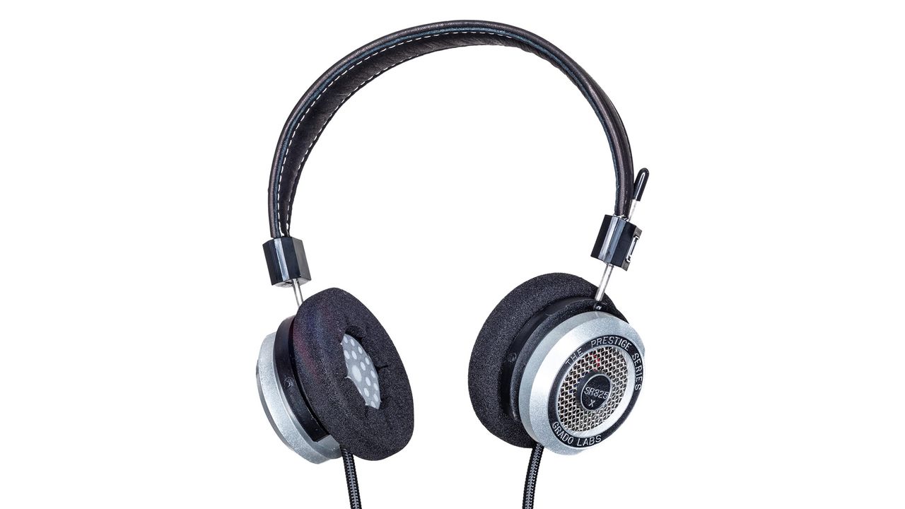 A silver pair of Grado SR325x over-ear headphones on a white background.