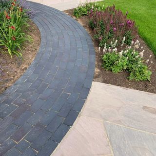 garden area with plants and rocks