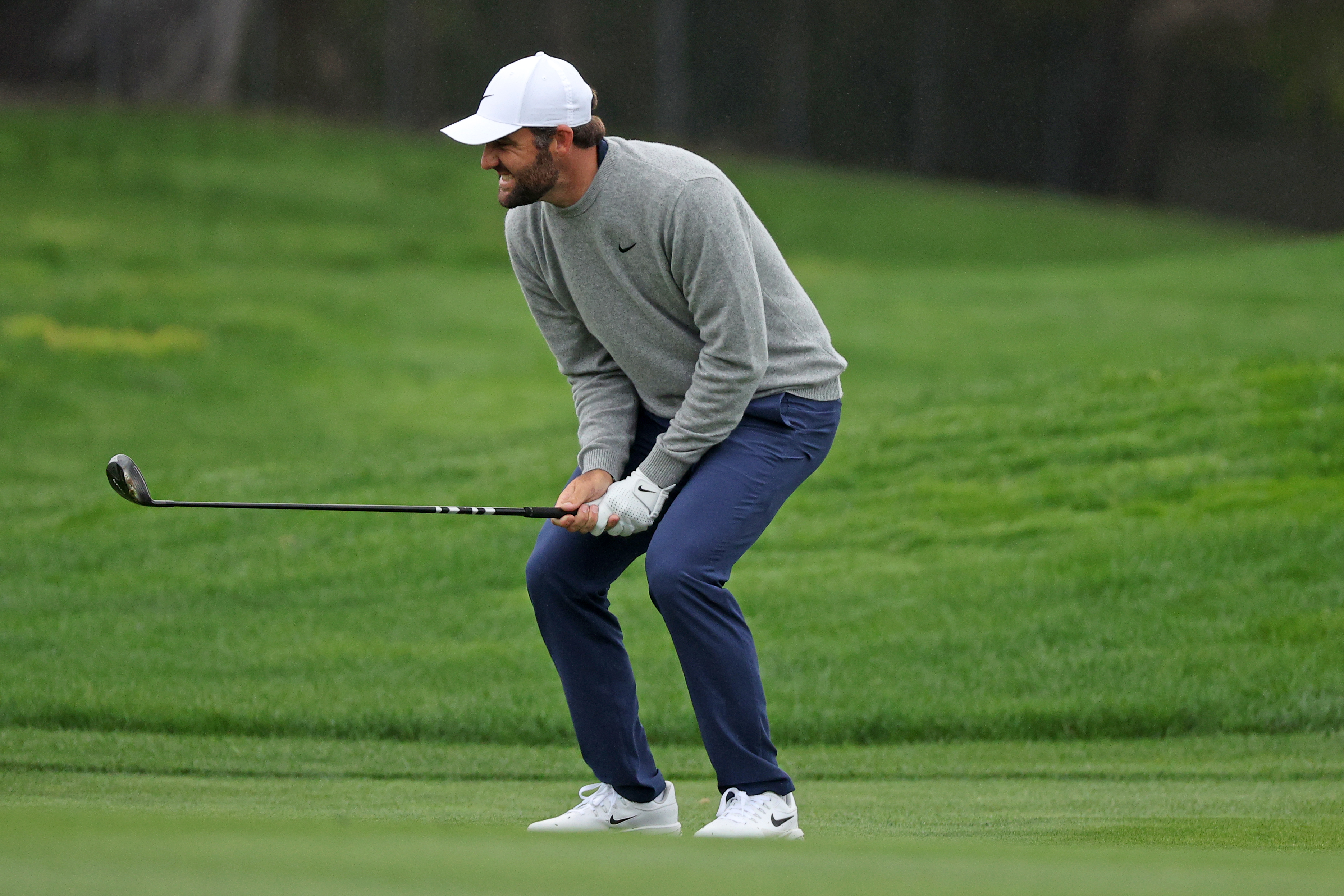 Scottie Scheffler reacts after a shot at Pebble Beach
