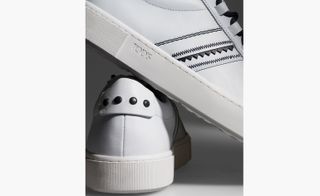 'Tods' white sneakers with black detail