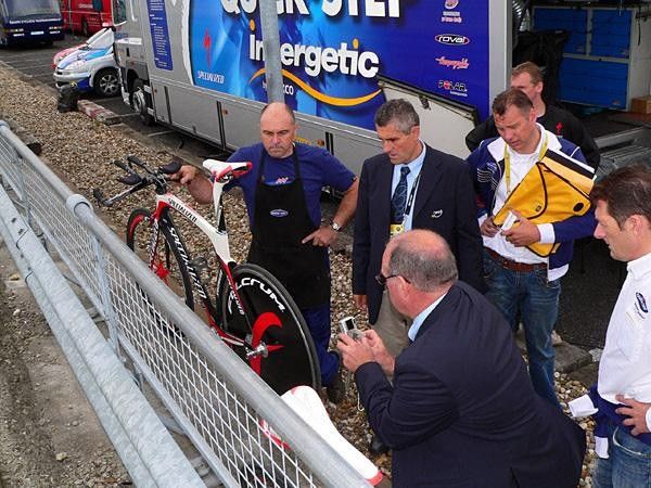 &hellip;while team officials nervously look on.