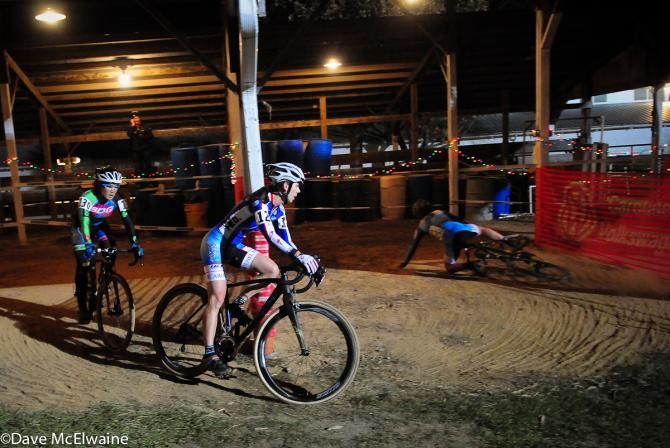 A rider goes down in the cow barn