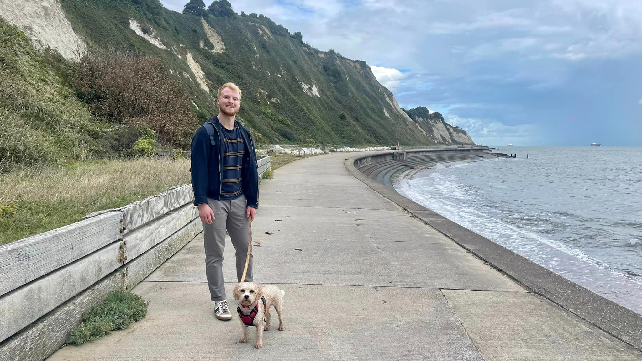 TechRadar fitness writer Harry Bullmore walking with his dog