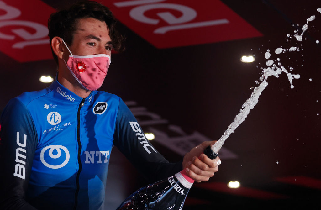 Team NTT Australias rider Ben OConnor celebrates on podium after winning the 17th stage of the Giro dItalia 2020 cycling race a 203kilometer route between Bassano del Grappa Madonna di Campiglio on October 21 2020 Photo by Luca Bettini AFP Photo by LUCA BETTINIAFP via Getty Images