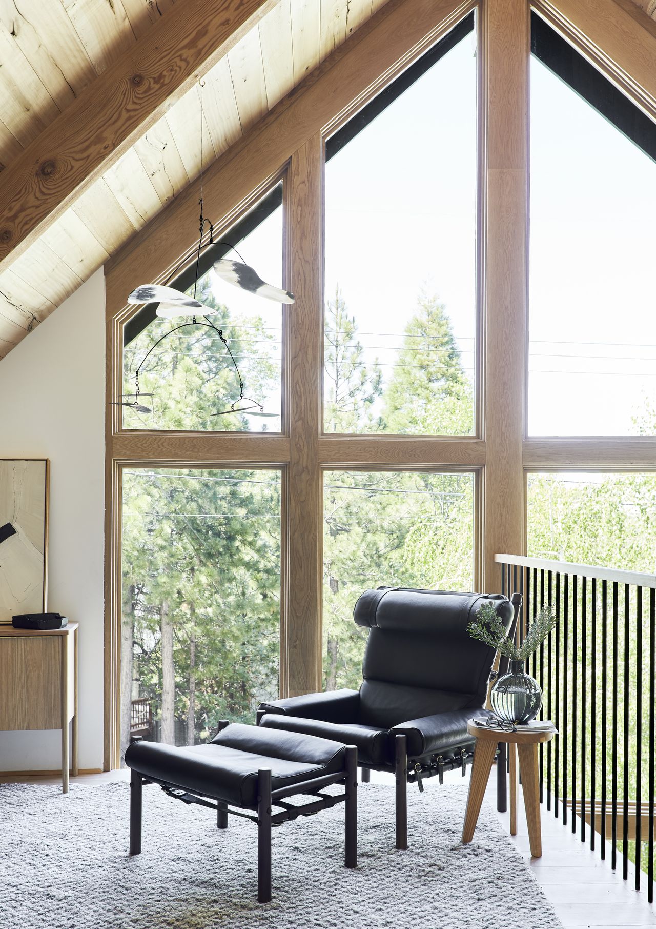 A lounge chair in the corner