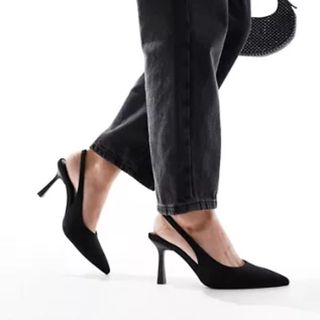 Image of woman wearing black heels