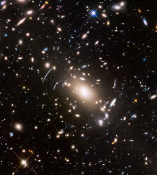 Observations of te galaxy cluster Abell S1063 can help scientists study the influence of dark matter.