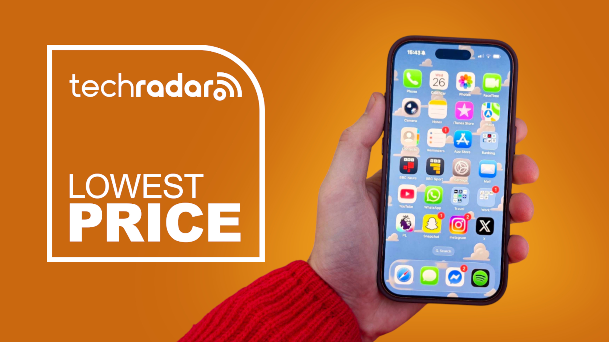 An iPhone 17 Pro being held in the hand on an orange background