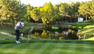 Sungjae Im hits an iron shot at Shadow Creek