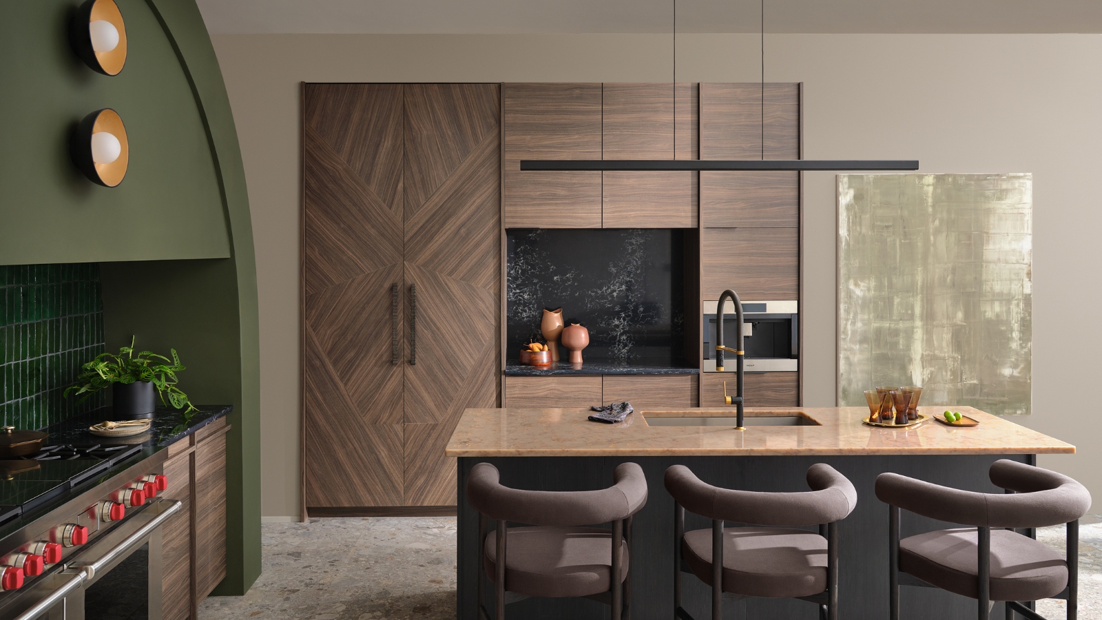 Modern kitchen dining area with wooden cabinets, a kitchen island, a green archway above a gas cooker, and three bar stools.