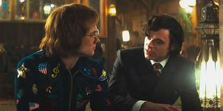 Taron Egerton and Richard Madden as Elton John and John Reid in Rocketman