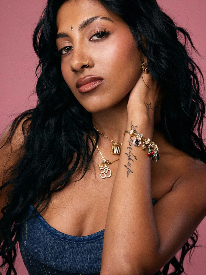 Lara poses with pandora jewelry on