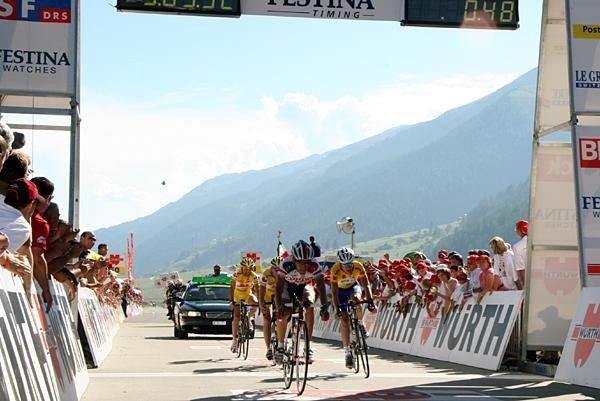 Daniel Atienza (Cofidis) takes a rather cheeky third.