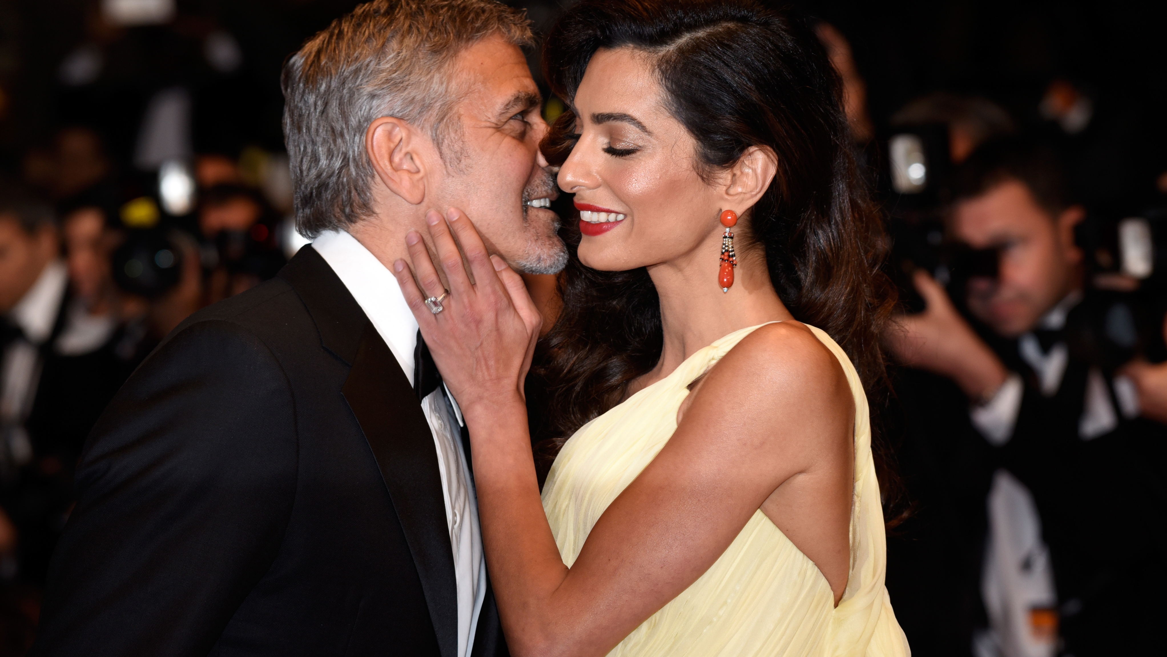 Actor George Clooney and his wife Amal Clooney attend the &quot;Money Monster&quot; premiere during the 69th annual Cannes Film Festival at the Palais des Festivals on May 12, 2016 in Cannes, France. (Photo by Clemens Bilan/Getty Images)