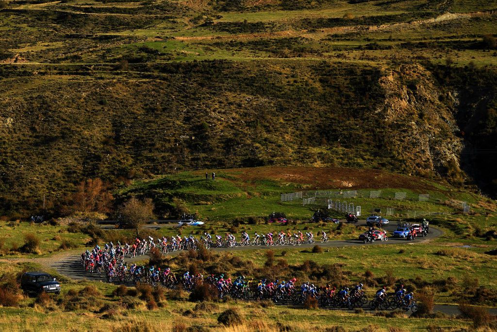 ALTODEMONCALVILLO SPAIN OCTOBER 28 Richard Carapaz of Ecuador and Team INEOS Grenadiers Red Leader Jersey Peloton Landscape Autumn during the 75th Tour of Spain 2020 Stage 8 a 164km stage from Logroo to Alto de Moncalvillo 1490m lavuelta LaVuelta20 on October 28 2020 in Alto de Moncalvillo Spain Photo by David RamosGetty Images