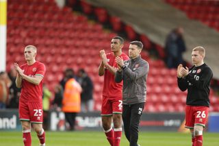 Mat Sadler, the manager of Walsall, and the players are applauding the fans after the Sky Bet League 2 match between Walsall and Salford City at the Banks's Stadium in Walsall, on April 1, 2024. (Photo by MI News/NurPhoto via Getty Images)