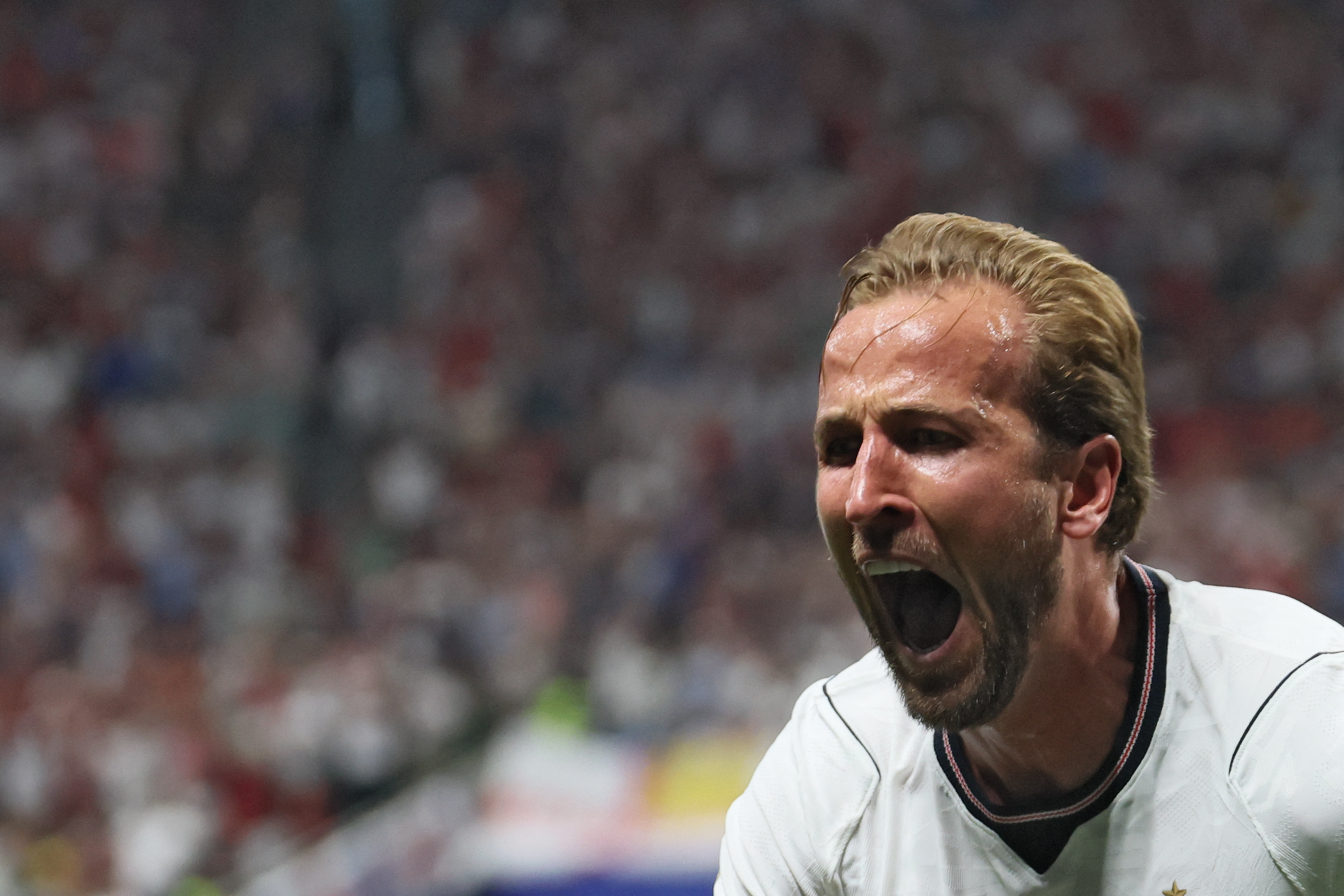 England's forward #09 Harry Kane celebrates scoring his team's second goal during the 2026 World Cup round of 32 match football between England and the Democratic Republic of Congo at the Atlanta Stadium in Atlanta on July 1, 2026.  (Photo by Odd ANDERSEN / AFP)