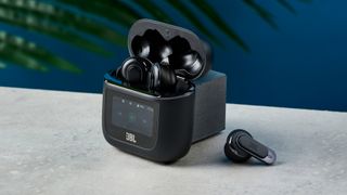 A pair of JBL Tour Pro 2 wireless earbuds in black