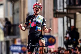 Team EF Education rider Italys Alberto Bettiol celebrates as he crosses the finish line to win the 18th stage of the Giro dItalia 2021 cycling race 231km between Rovereto and Stradella on May 27 2021 Photo by Luca Bettini AFP Photo by LUCA BETTINIAFP via Getty Images