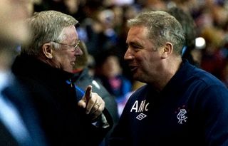 24/11/10 CHAMPIONS LEAGUE.RANGERS v MANCHESTER UNITED (0-1).IBROX - GLASGOW.Rangers assistant manager Ally McCoist (right) chats with Manchester Utd boss Sir Alex Ferguson (Photo by Sammy Turner\SNS Group via Getty Images)