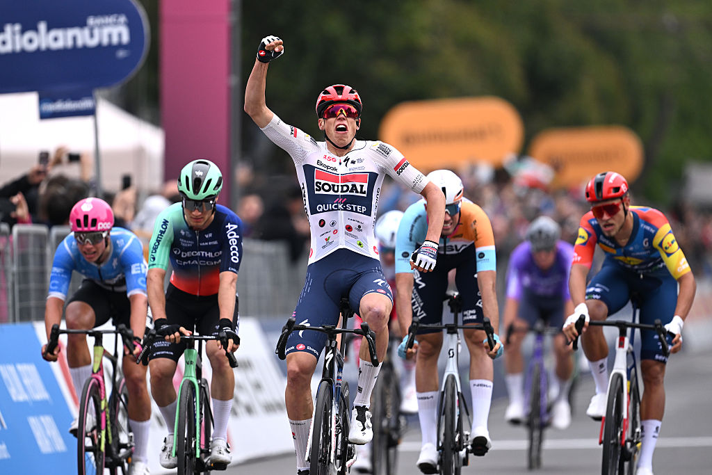Paul Magnier celebrates as he wins the first stage