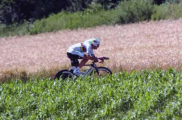 Fabian Cancellara (CSC) sweeps through the fields