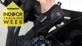 Close up of Shimano's best indoor cycling shoes clipped into pedal, with yellow Indoor Training Week badge overlaid
